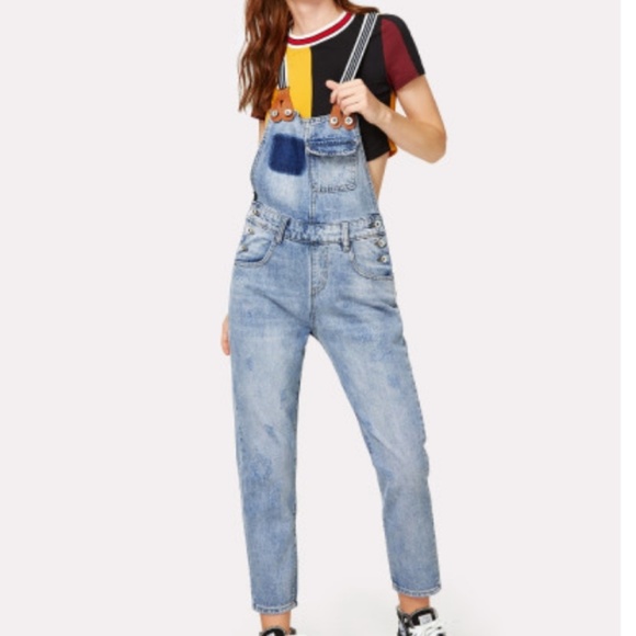 distressed jean jumpsuit